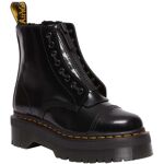 35% de descuento en botas Dr. Martens Sinclair FL negras... DressInn